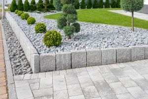 A beautifully installed cobblestone edging defining a garden pathway