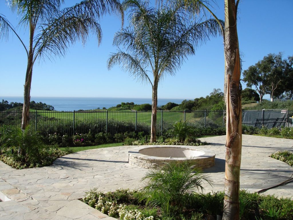 A freshly cleaned flagstone patio with a natural finish